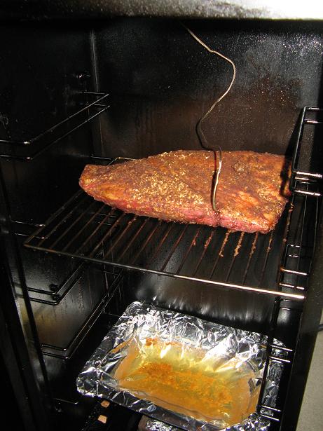 Cold Weather in Florida - Making a brisket in the smoker.JPG